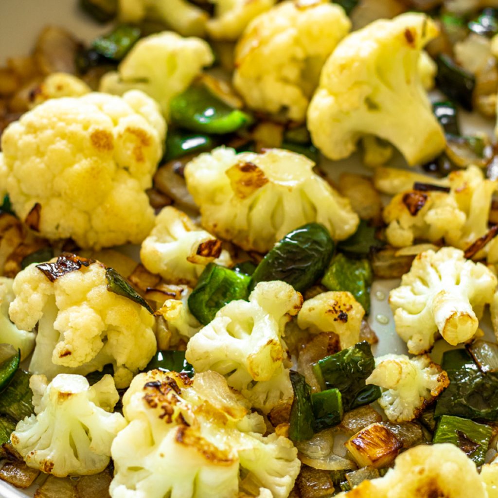 charred cauliflower, poblano peppers, and onion