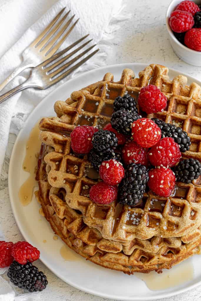 oat waffles with raspberries, blackberries, and hemp seeds