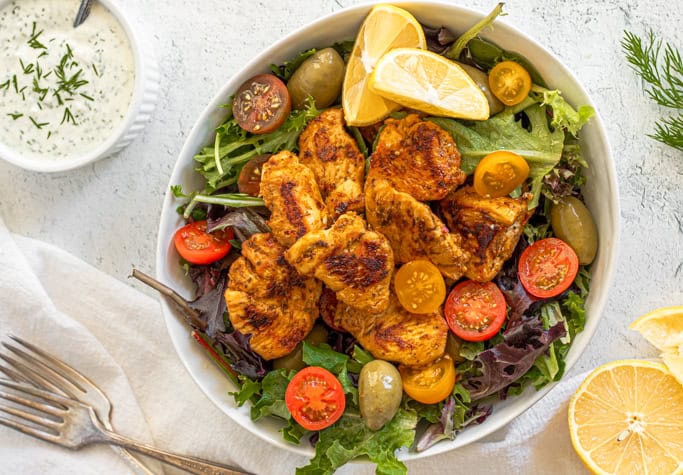 greek chicken gyro salad with lemon and greek yogurt sauce
