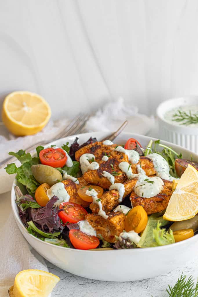 Gyro chicken salad with lemon and cherry tomatoes 